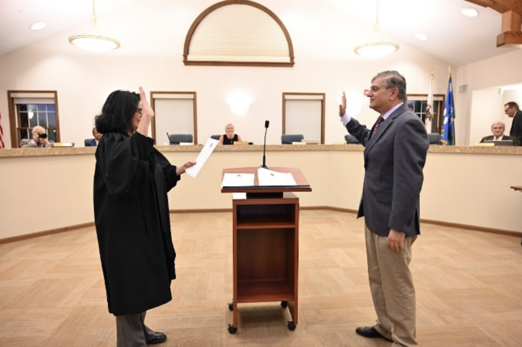 Swearing in of Trustee Shahzad Kazi. retired Honorable Judge Ketki Steffen and Trustee Shahzad Kazi. 